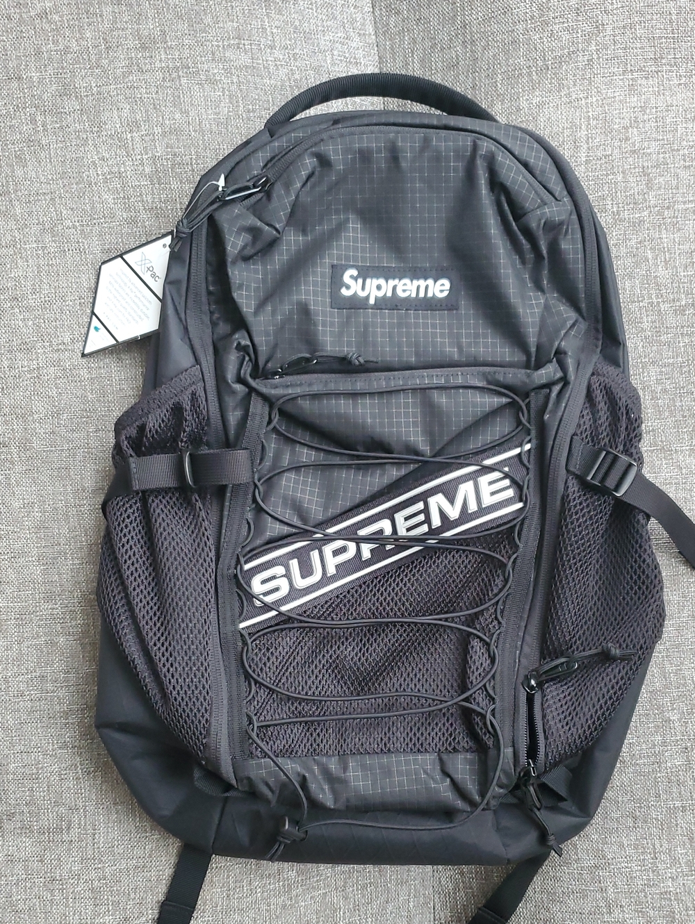 Supreme Log Black Backpack FW23 Grid